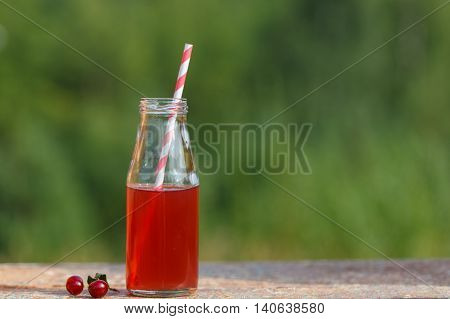 Closeup Of A Red Detox Drink With A Red Drinking Straw