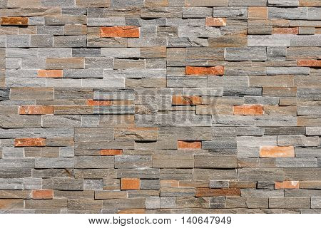 closeup of natural stone wall cladding background