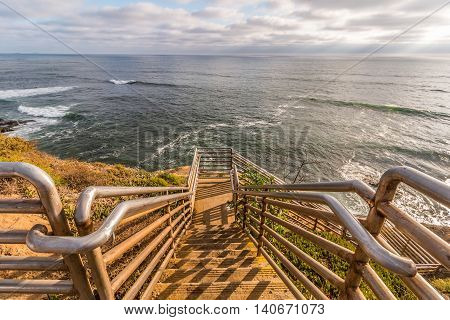 Ladera Street ladder overlooking ocean at Sunset Cliffs in San Diego, California.