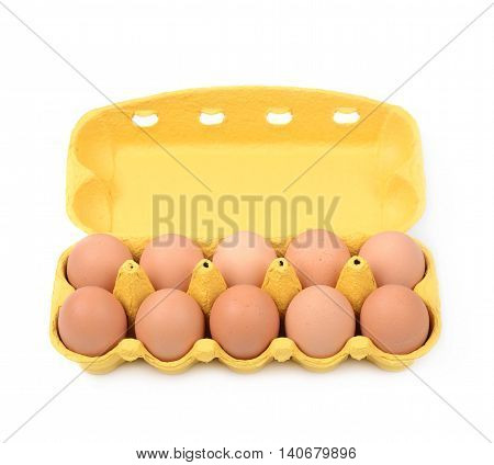 Yellow egg carton case isolated over the white background