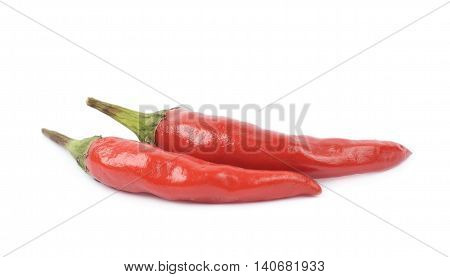 Few red italian peppers, composition isolated over the white background