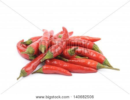 Pile of red italian peppers isolated over the white background