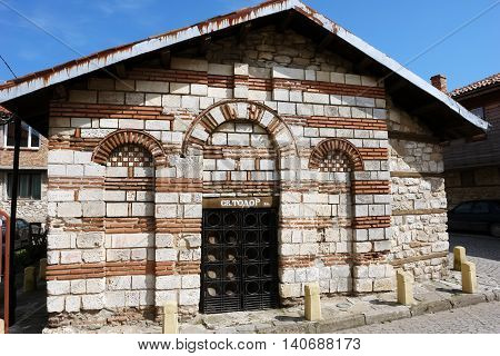 NESSEBAR BULGARIA - MAY 07 2011: The ancient church of Saint Todor on the small street in the old Nessebar town coast of Black Sea Sunny Beach Bulgaria.