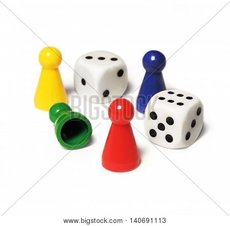 Playing pieces and dice, isolated on white background.