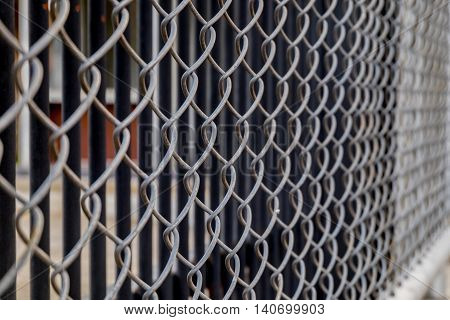 Close up Metal fence background. (Selective focus)