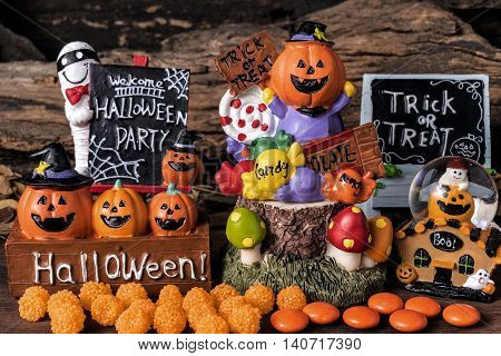 Halloween ornament party with orange candy and trick or treat board