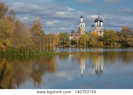 autumn landscape with views of the ancient Orthodox Church, which stands on the banks of the Oka river