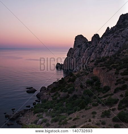 View of Blue bay and mount Karaul-Oba at sunset. Crimea Black Sea.