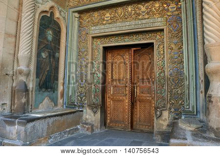 The main entrance to the Etchmiadzin Cathedral in Vagharshapat, Armenia. Which is considered the oldest in the world