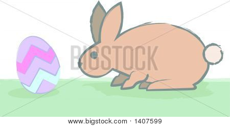 Forsigtig Bunny snuser ægget