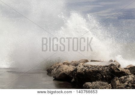 Breaking waves on rocks on the Adriatic Sea.