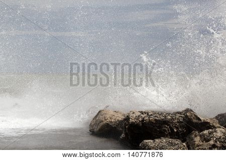 Breaking waves on rocks on the Adriatic Sea.