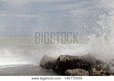 Breaking waves on rocks on the Adriatic Sea.