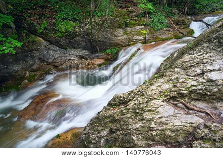Dzhur-Dzhur waterfall on the river East Ulu-Uzen in the gorge haphal, Crimea, Russia.
