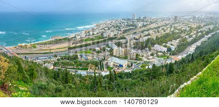 Panorama of Haifa from the of Carmel Mount overlooking residential districts beaches and the coastline Israel.