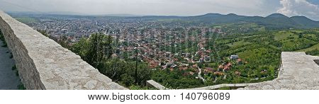 Panoramic and aerial view of one part at the city of Deva Romania from the ruins of a citadel built in 1250 and located at an altitude of 371 meters above the city.