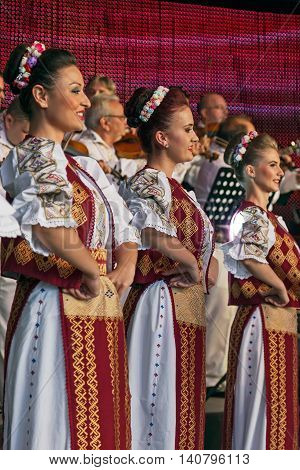 ROMANIA TIMISOARA - JULY 8 2016: Romanian dancers in traditional costume present at the international folk festival "International Festival of hearts" organized by the City Hall Timisoara.