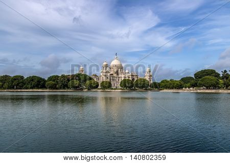 Beautiful Victoria Memorial with adjoining lake and lovely blue sky