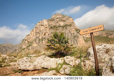 A sign indicating the Sicilian Zingaro Natural Reserve in the San Vito Lo Capo area of northern Sicily Italy