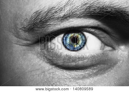 Image of man's eye with time concept