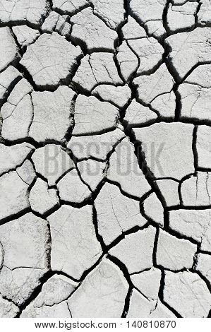 Landscape with cracked earth near mud volcanoes also known as mud domes