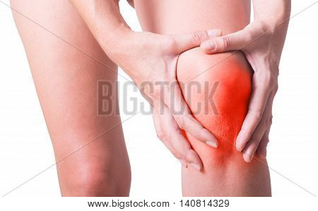 Knee pain of the woman isolated on white background with clipping path included