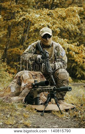 Sniper and spotter of Green Berets US Army Special Forces Group in action