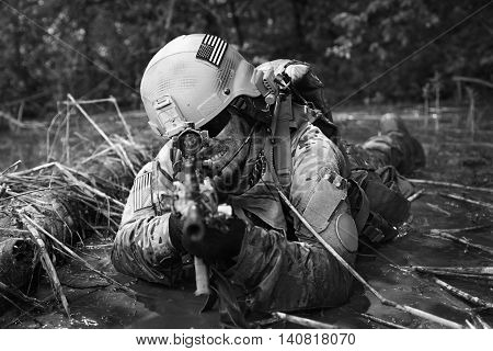 Green Berets US Army Special Forces Group soldier in action