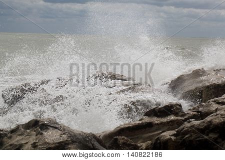 Waves breaking on rocks at the Adriatic Sea.