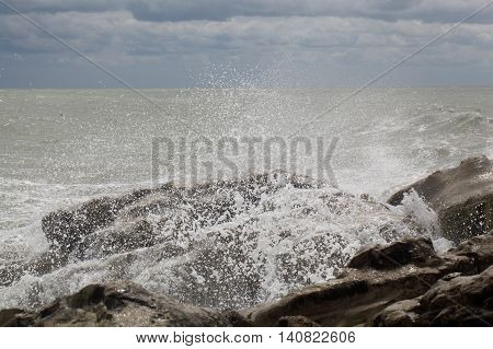 Waves breaking on rocks at the Adriatic Sea.