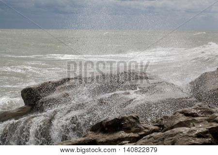 Waves breaking on rocks at the Adriatic Sea.