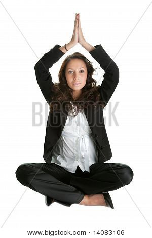 Empresaria sentado en posición de flor de loto