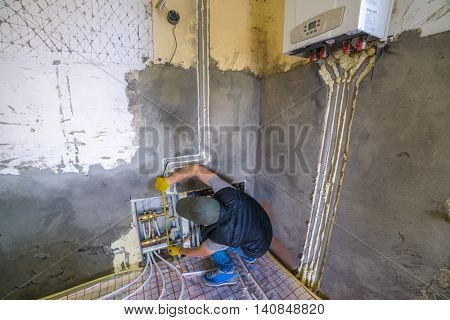 pipefitter installing system of heating