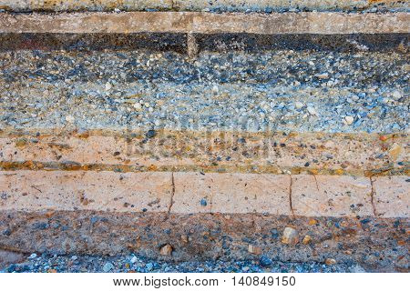 Layers soil and rock of traffic road Layer soil paving Layer of crush rock.