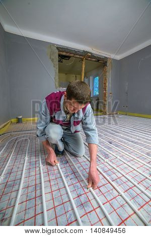 pipefitter installing system of heating