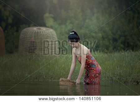 Girl's traditional way of life in the local region. Simpler the lifestyle