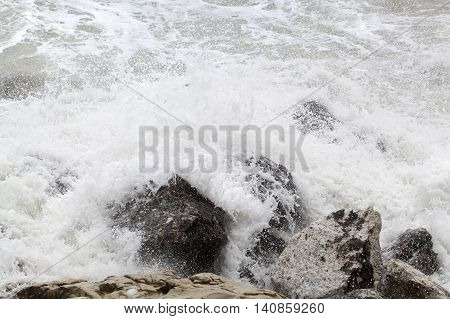 Waves breaking on rocks at the Adriatic Sea.