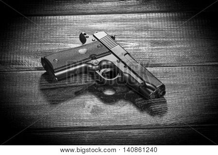 Airsoft gun replica on dark background