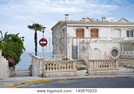 Ruined house at seaside in Santa Pola town. It is a coastal town located in the comarca of Baix Vinalopo in the Valencian Community Alicante Spain by the Mediterranean Sea.