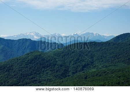 Mountain landscape forest sky summer during the day