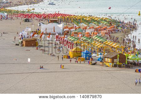 Mamaia Romania - July 18 2016:People enjoying on beach in Mamaia Mamaia is the best known resort on Romanian Riviera.It's situated on 8km long and 300m wide sandy land at the Black Sea.