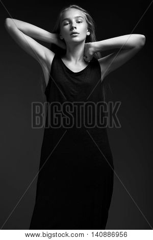 Fashion Model With Long Hair, Beautiful Eyes, Perfect Skin Is Posing In Studio For Glamour Test Phot