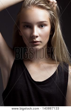 Fashion Model With Long Hair, Beautiful Eyes, Perfect Skin Is Posing In Studio For Glamour Test Phot
