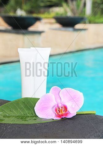 cosmetics for care cosmetic bottles and orchid