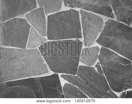Gray stone wall in resort. Nature background.