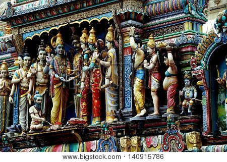 Singapore - December 13 2007: A frieze of Hindu figures decorates the entry Sikhara Tower at the Sri Krishnan Temple on the Albert Mall / Waterloo Road