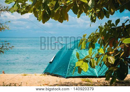 Photo of the Camping Tent on Beach. Concept tourism active rest