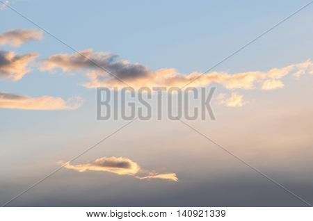 Sunrise of a summer morning , with small clouds