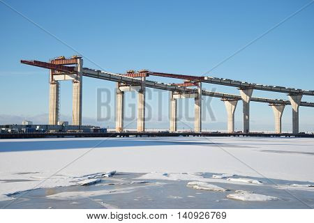 A view of the construction of the Central section of Western high-speed diameter in the Gulf of Finland, february day. Saint Petersburg