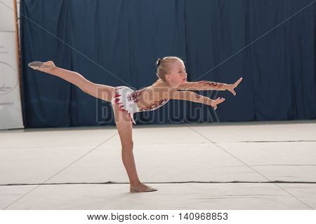 Warsaw Poland - June 25 2016: Young gymnast during her performance